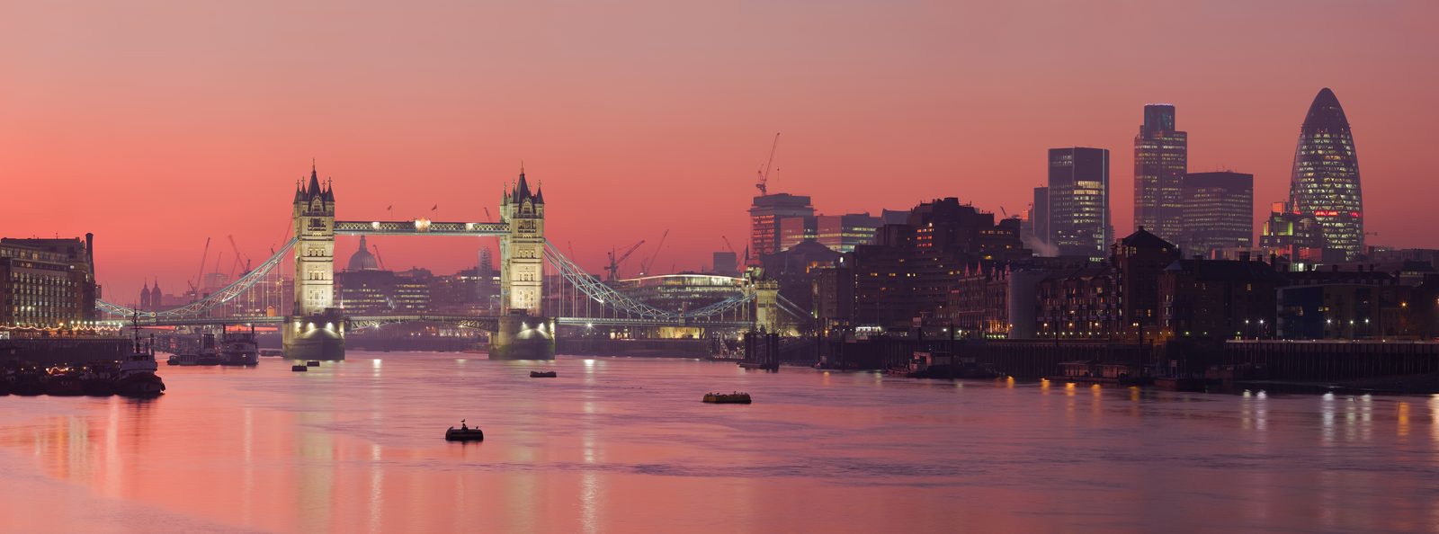 The Thames at sunset with the City of London skyline