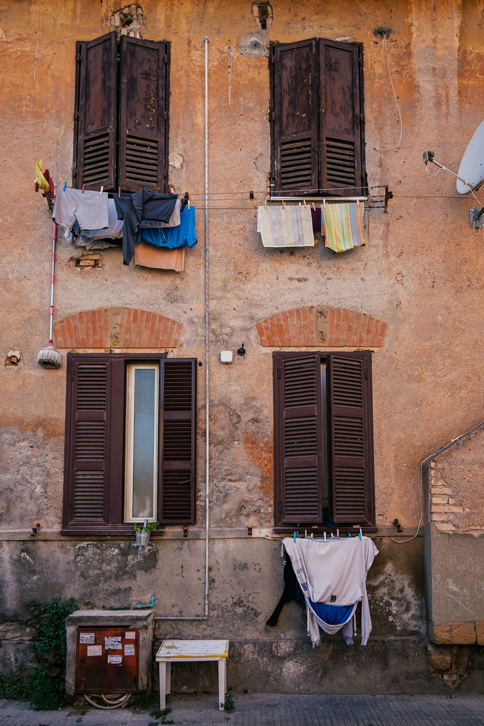 Laundry drying from a Garbatella building