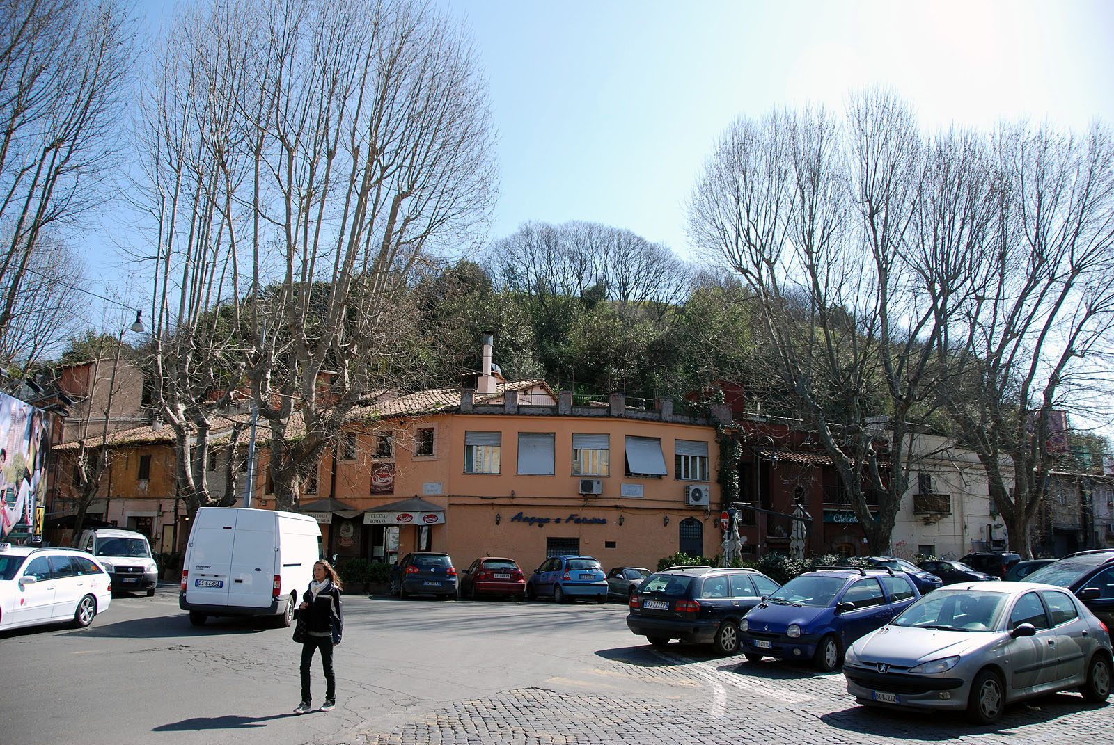 A Testaccio piazza with Monte Testaccio rising behind the buildings